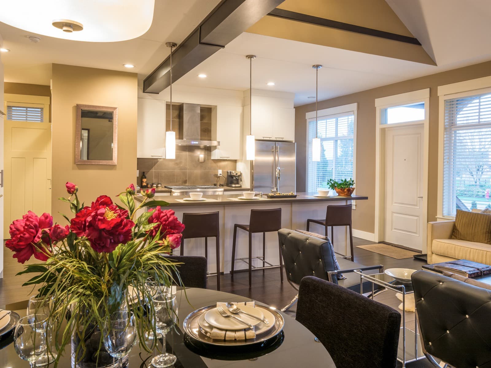Home interior with a dining and kitchen area.